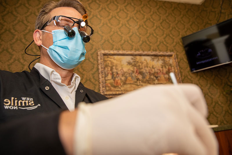 doctor performing dental guided procedure